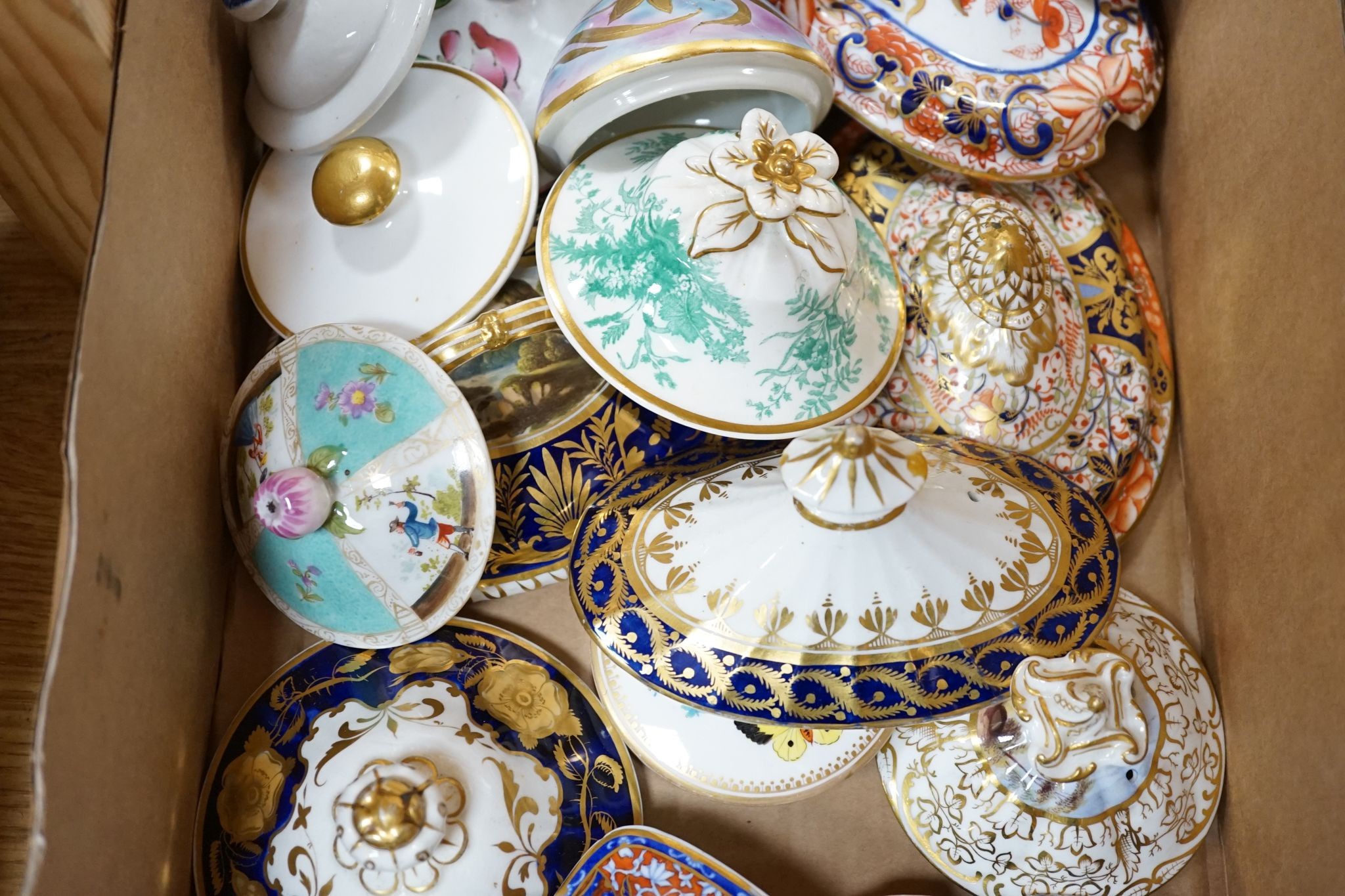 A mixed collection of porcelain covers